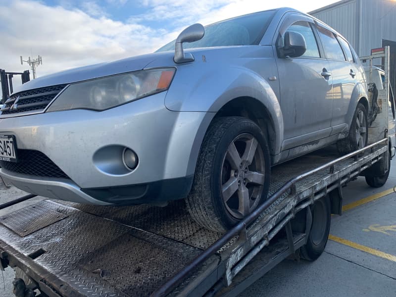 Tow truck collecting an unwanted car for cash in Tauranga